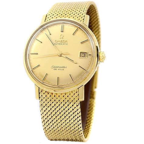 omega seamaster 18ct gold watches.